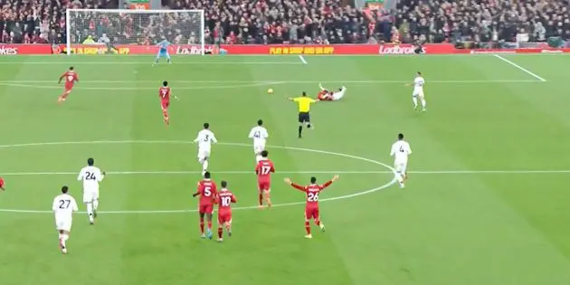 David Coote waves play on after Salah is fouled