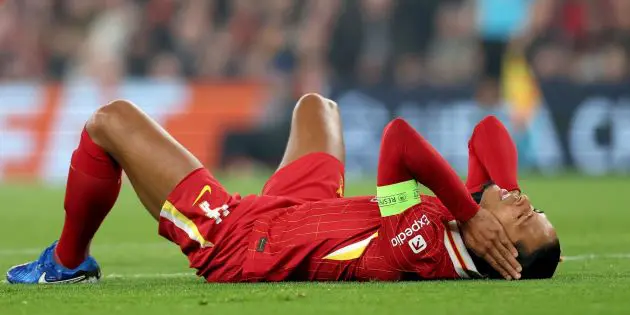 Virgil van Dijk lays injured on the floor for Liverpool