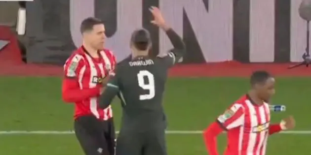 Darwin Nunez and Jan Bednarek hug
