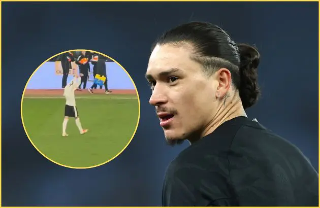 Liverpool striker Darwin Nunez looks at picture of himself leaving Villa Park.