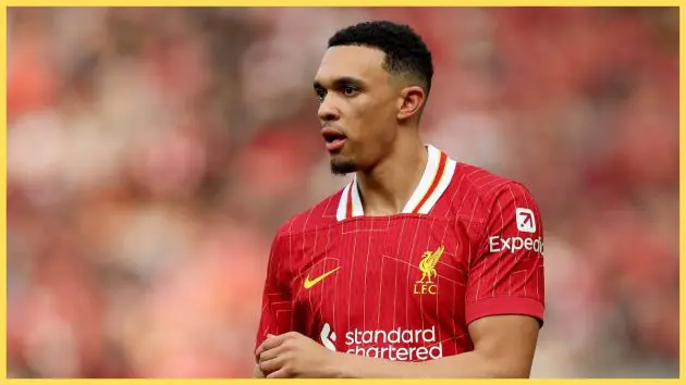 Trent Alexander-Arnold crosses one arm against his body.