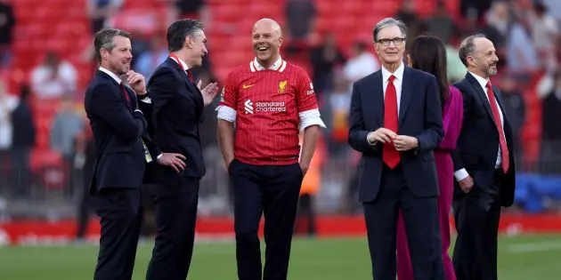 John Henry with Arne Slot and other Liverpool officials