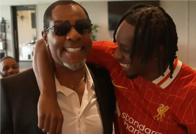 Jeremie Frimpong enjoys a family moment after signing for Liverpool