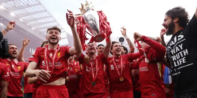 Andy Robertson celebrates with the Premier League title