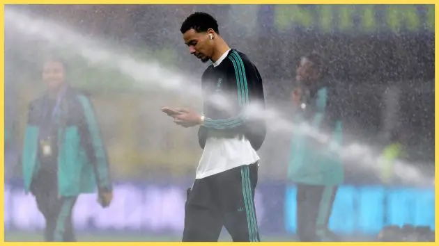 Hugo Ekitike on his phone in the San Siro