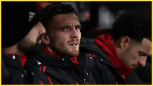 Andy Robertson sits on the bench against Bournemouth