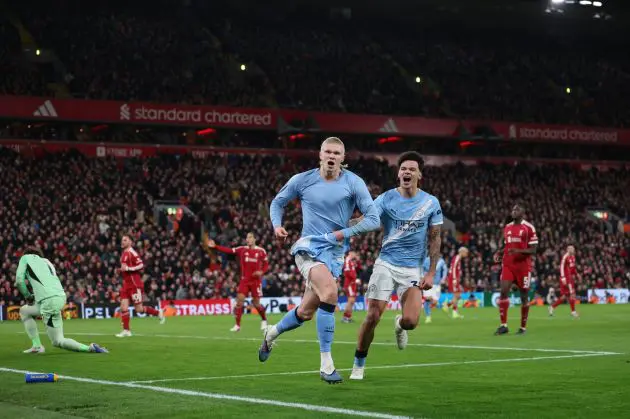 Erling Haaland celebrates scoring a stoppage-time winner at Anfield