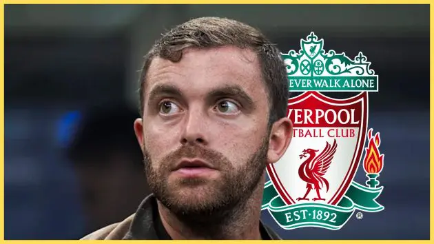 Transfer news expert Fabrizio Romano looks on in front of Liverpool club crest.